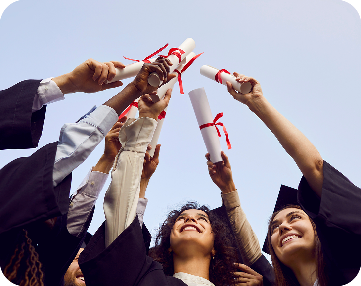 Graduates holding certificates